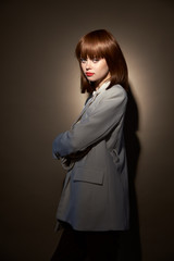Fashionable model in fashion clothes gesticulate with hands