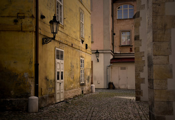 Old Prague street stock images. Ancient architecture in Prague. Prague old town photo. Old houses in european city images. Ancient street in Czech Republic. Mysterious Prague stock images