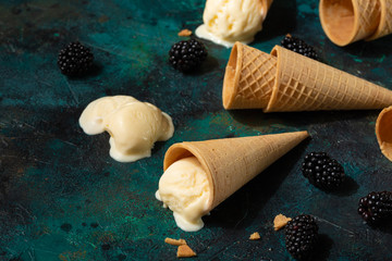 Ice cream melting close up with berries, summer mood