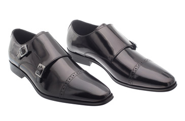 Black patent leather men shoes against white background