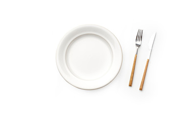 Top view of empty plate isolated on white background