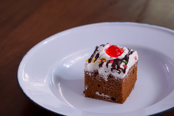 Cake topped with red jelly.