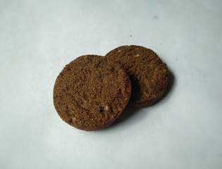 Close-up chocolate cookies in white background  