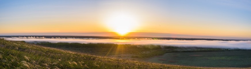 sunrise, fog over the river panorama of the landscape in the early morning. pink sky before sunrise . background image.