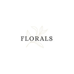 A branch with leaves. Vector hand drawn floral logo template.