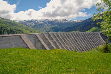 Weir and lake of Roselend, french Alps