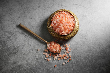 Fototapeta na wymiar Himalayan pink salt in golden box at loft kitchen