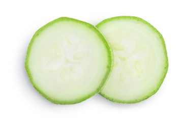zucchini or marrow slices isolated on white background with clipping path and full depth of field. Top view. Flat lay
