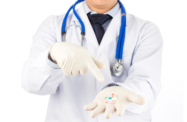 doctor pointing medicine pills in white background