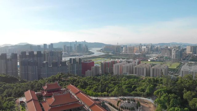 Aerial view of Macau cityscape, Cotai Strip and A-Ma Temple in Coloane