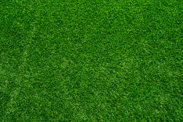 Fototapeta premium Artificial grass field meadow green. Top View Texture. 