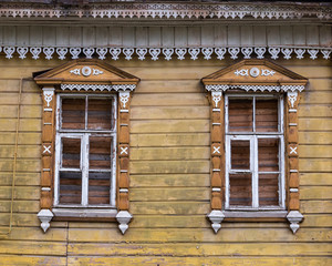 Wood carving on the facade of an old house