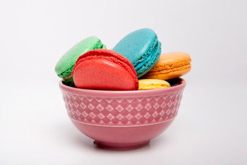 Sweet and colourful macaroons or macaron on white background, Desert. 