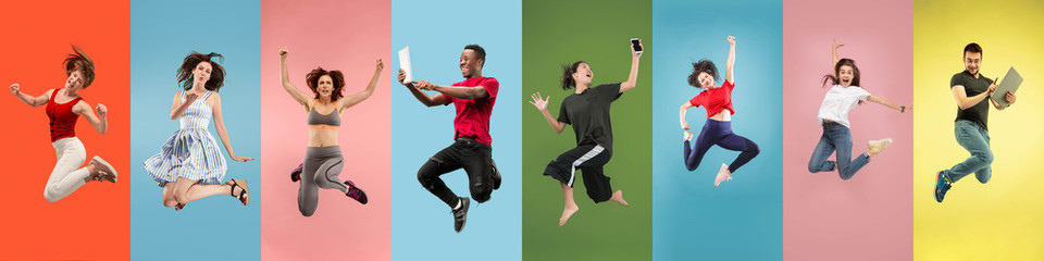 Collage of portraits of 7 young jumping people on multicolored background in motion and action. Concept of human emotions, facial expression, sales. Smiling, cheerful, happy. Using devices, gadgets. - obrazy, fototapety, plakaty