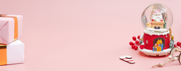 Banner, Christmas composition, gifts on pastel pink background, copy space