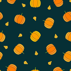 Bright pumpkins with yellow leaves on dark turquoise  background. Seamless autumn food pattern. Suitable for packaging, textile, wallpaper.