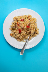 fresh vegetable salad with couscous on the plate