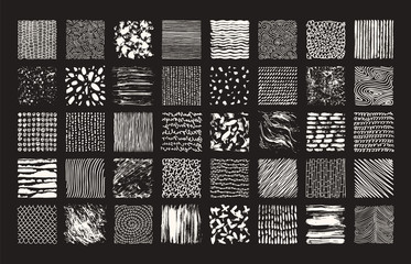 Hand drawn textures and brushes. Big artistic collection of handcrafted design elements: rough graphic patterns, ethnic ornaments, abstract lines, tribal symbols made with ink. Isolated vector set.