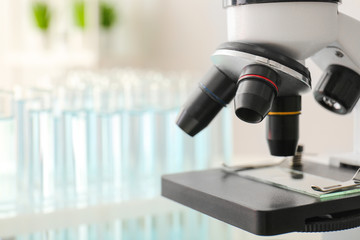 Modern microscope in scientific laboratory, closeup