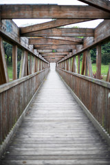 Fototapeta na wymiar Infinite bridge alone of wood 