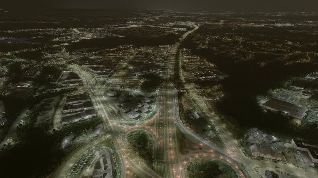 A huge flyover of the DC residential area late at night