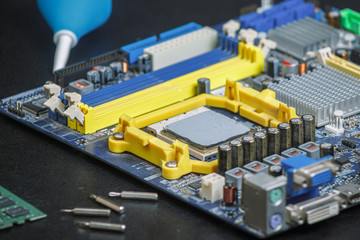 computer motherboard two RAM slots, processor on the table repair equipment
