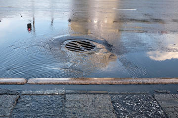 drainage hole after rain. For flood protection within the residential area of ​​the urban community.