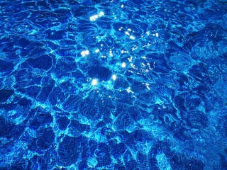 Pool water. Clear water in the blue pool.