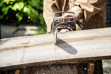 man chopping fire wood