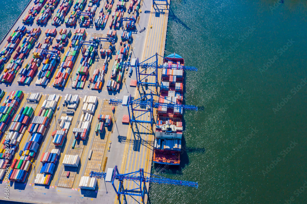 Poster aerial top view container cargo ship waiting for loading, import export business logistic and transp