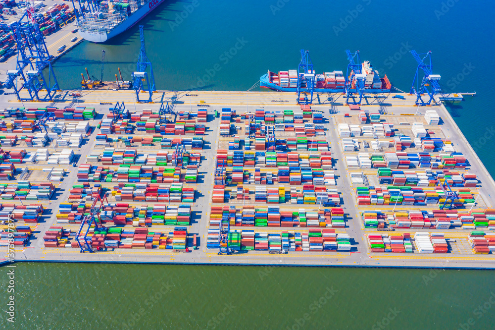 Poster aerial top view container cargo ship waiting for loading, import export business logistic and transp