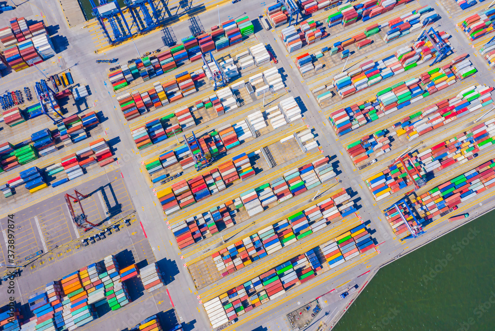 Poster aerial top view container cargo ship waiting for loading, import export business logistic and transp