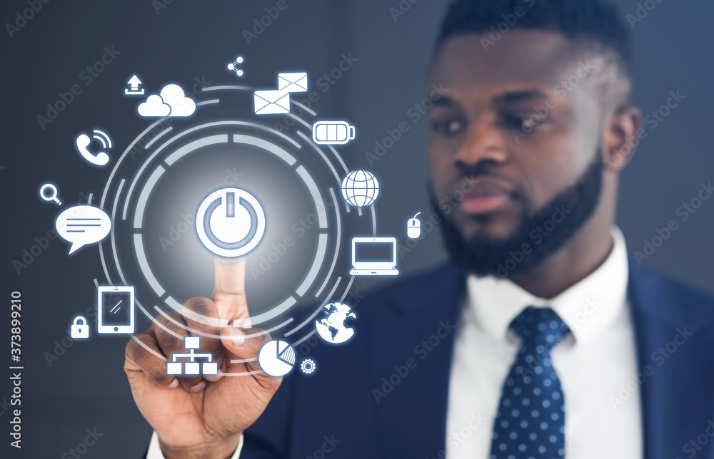 Poster iot. black businessman pressing start button on virtual screen with communication icons