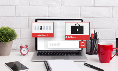 Laptop on the desk with job search engine on display