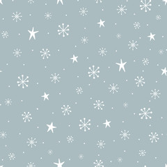 Christmas seamless pattern with snowflakes and stars.