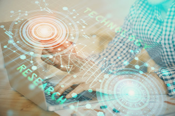 Businessman with computer background with technology theme hologram. Concept of big data. Double exposure.