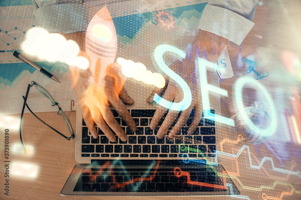 Poster double exposure of seo icon with man working on computer on background. concept of search engine opt