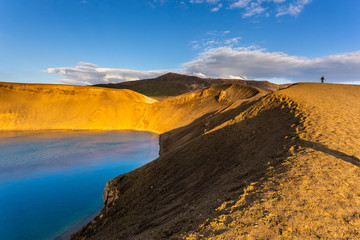 View of the Krafla, active caldera with a blue crater lake, Iceland.