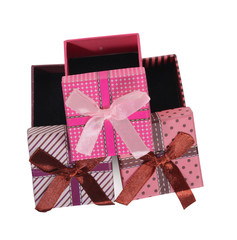 Red open gift box with ribbon isolated on white background