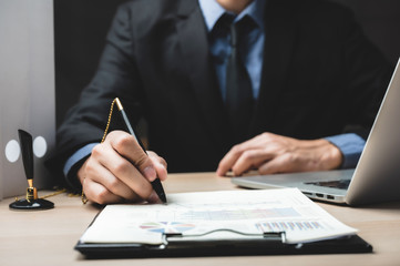 Close up business man signing contract making a deal, classic business success concept
