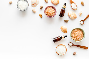 Spa bath salt and sea seashells top view