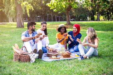 Best friends are on picnic in the park.