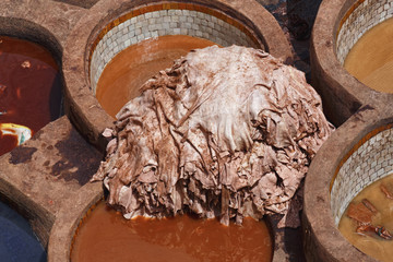 Heap of the leathers in tannery of Fez, Morocco. The tanning industry in the city is considered one...