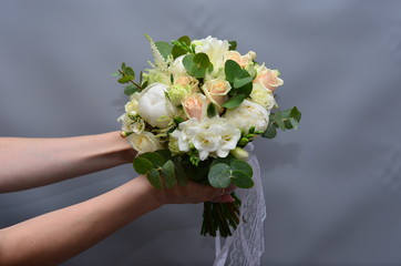 Wedding bouquet with peonies