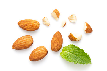 Almonds and Mint leaves isolated on white background
