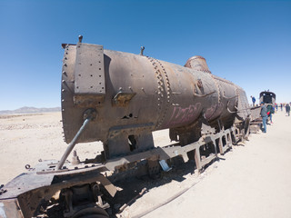Fototapeta na wymiar rusty steam locomotive near Uyuni in Bolivia. Cemetery trains.