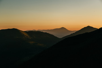 Amazing sunset in the wild ukrainian ridge Marmarosy, near Romania