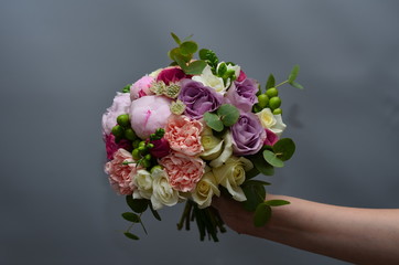 Wedding bouquet with peonies