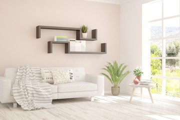 White living room with sofa and summer landscape in window. Scandinavian interior design. 3D illustration