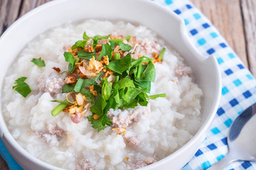 Breakfast rice porridge on a wooden table